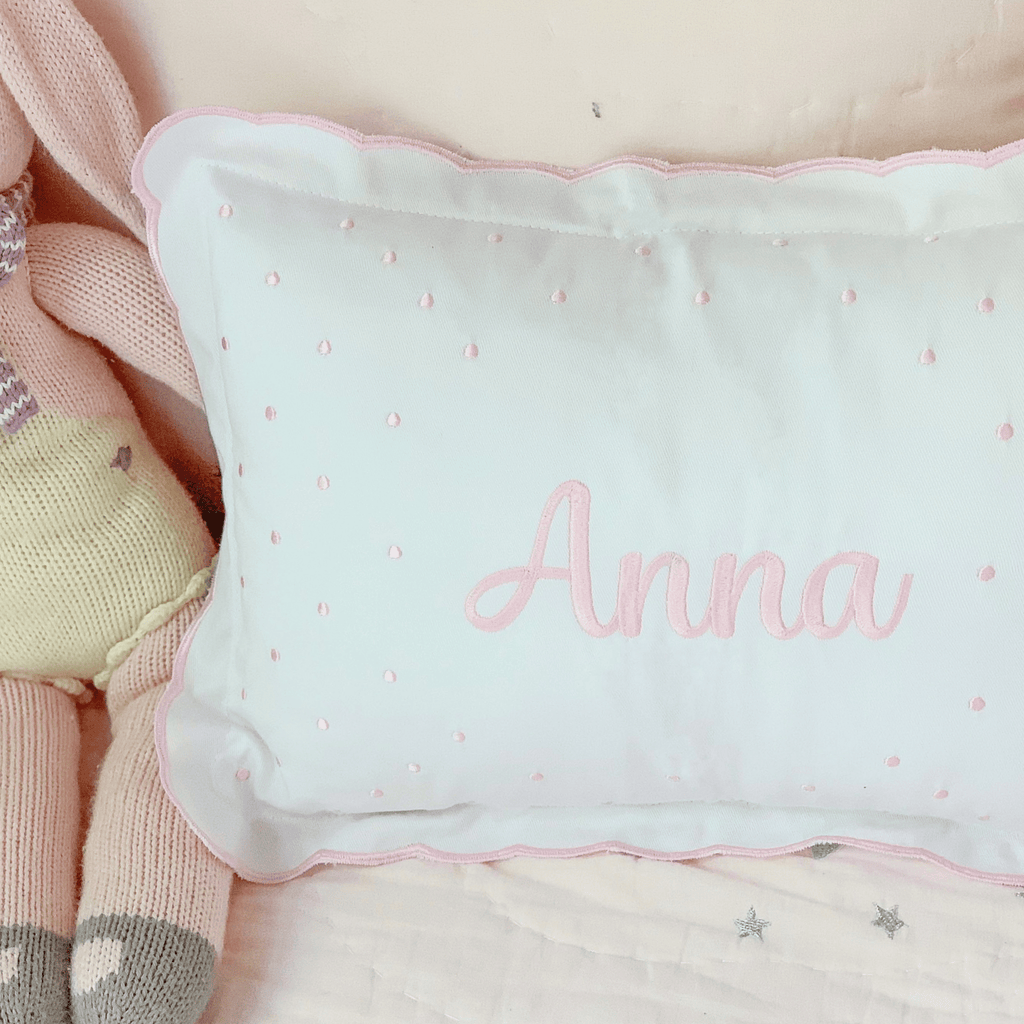 Scallop-edge pillow with swiss dots  Stitchmonograms   